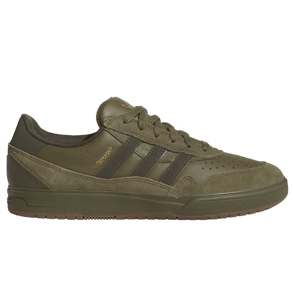 The JQ1132 Tyshawn 2 Adidas Skateboarding Shoe features an olive green upper with matching laces, perforated toe, dark green side stripes, a brown sole with Lightstrike cushioning, and gold YOSKAWA branding for a premium look.