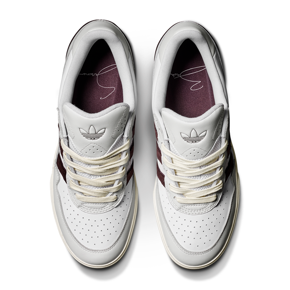 A pair of JQ1620 Crystal White Brown Zach Saraceno Tyshawn 2 II Adidas Skateboarding Shoes with maroon accents, beige laces, perforated toe boxes, and Lightstrike midsoles, viewed from above on a white background.