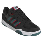 The JS4307 Core Black Preloved Teal Better Scarlet Tekkira Suede Leather Adidas Skateboarding Shoes have teal and red stripes, a white midsole, teal outsole accents, LIGHTMOTION comfort, and Adidas logo on the tongue, shown at a three-quarter angle.