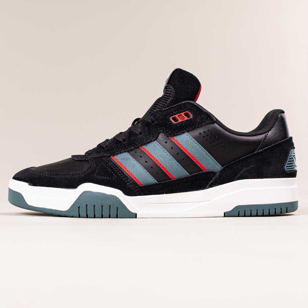 The JS4307 Core Black Preloved Teal Better Scarlet Tekkira suede leather Adidas Skateboarding Shoes feature blue and red stripes, a white midsole, and teal outsole, with adidas LIGHTMOTION cushioning, shown on a light beige background.