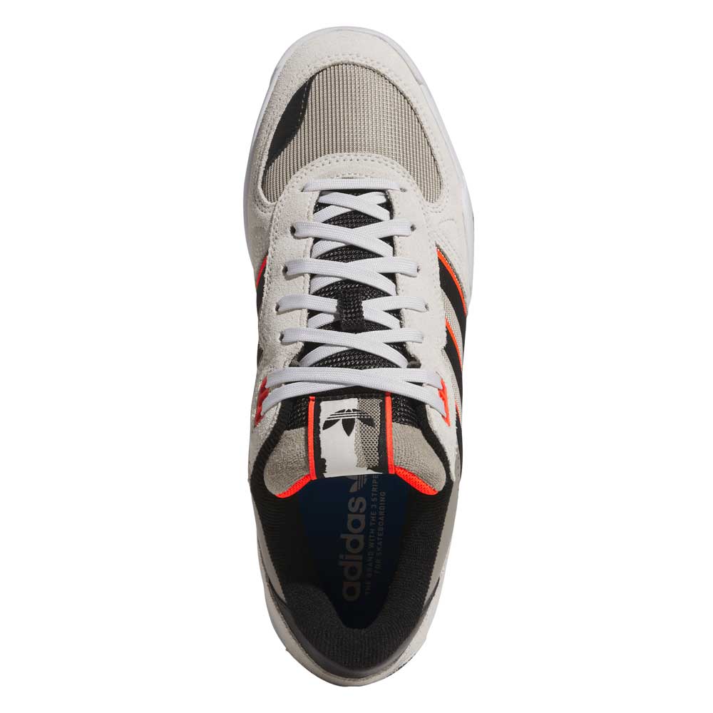 Top view of the JS8906 Orbit Grey/Core Black/Solar Red Tekkira suede leather Adidas skateboarding shoe, with black stripes, white laces, adidas LIGHTMOTION, cupsole comfort, and a navy insole with Adidas logo.