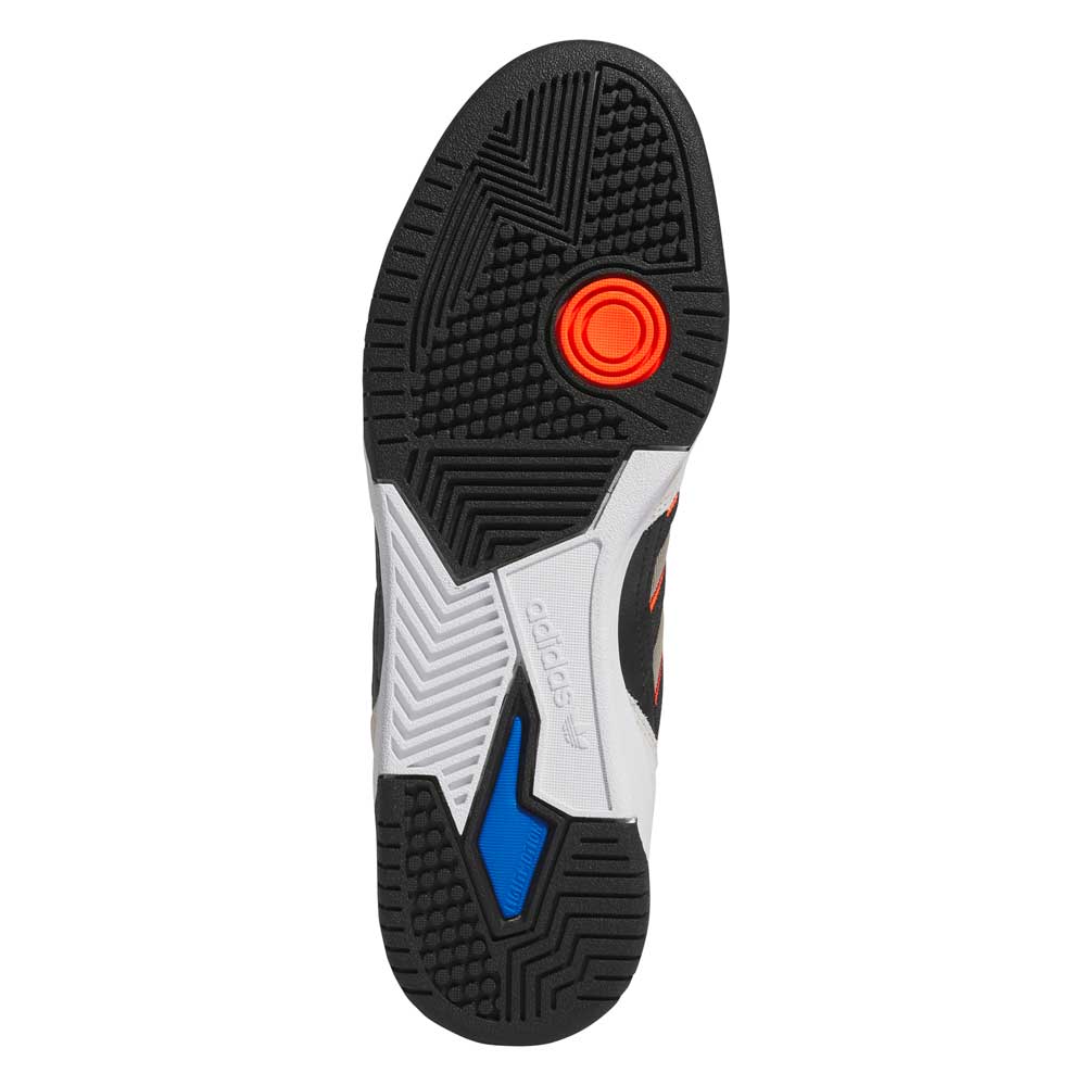 The image shows the sole of the JS8906 Orbit Grey Core Black Solar Red Tekkira Suede Leather Adidas Skateboarding Shoe, featuring black rubber tread, geometric patterns, a white Adidas logo section, blue accent, and an orange circular detail.
