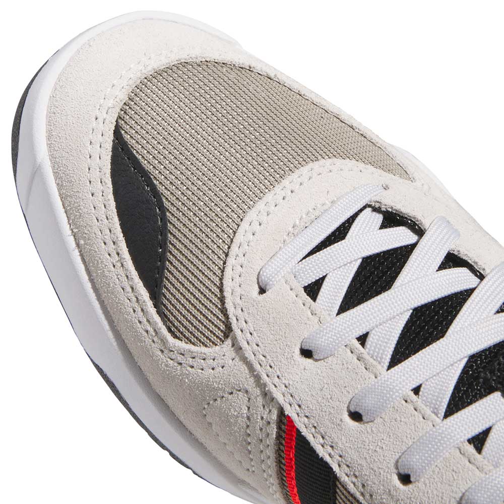Close-up of JS8906 Orbit Grey Core Black Solar Red Tekkira Suede Leather Adidas Skateboarding Shoes, featuring off-white suede, beige mesh upper, black accents, white laces, cupsole comfort sole, and a small red detail.