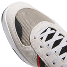 Close-up of JS8906 Orbit Grey Core Black Solar Red Tekkira Suede Leather Adidas Skateboarding Shoes, featuring off-white suede, beige mesh upper, black accents, white laces, cupsole comfort sole, and a small red detail.