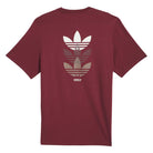 The JW0056 Skate Tee Burgundy by Adidas Skateboarding features short sleeves and three overlapping white and gray trefoil logos on the back, crafted from imported fabric for quality and comfort.