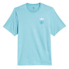 The JY3954 Skate Tee in Preloved Blue/Bright Royal by Adidas Skateboarding features short sleeves, a crew neckline, and three stacked Trefoil logos on the left chest. Style code: JY3954.