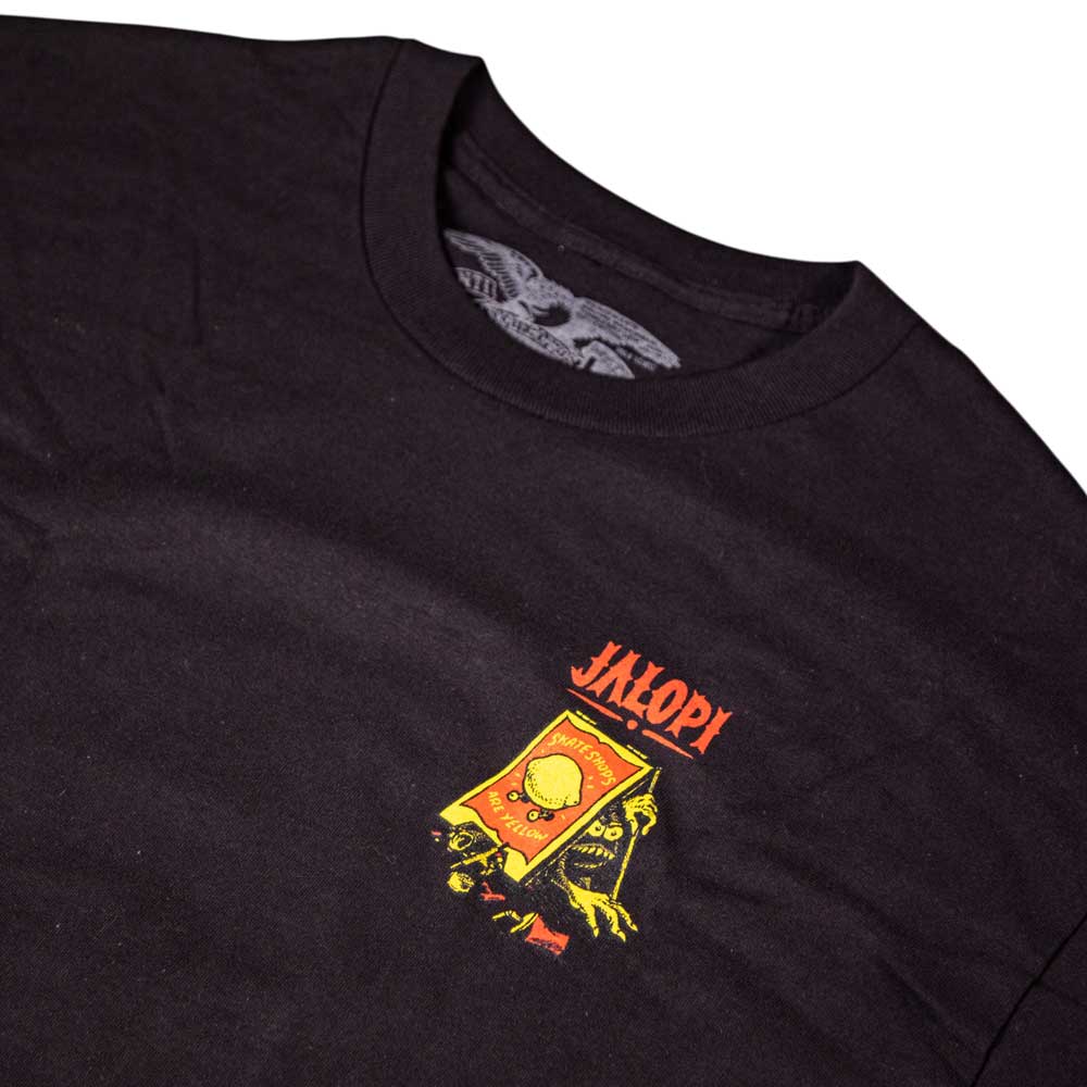 The Jalopi Shop Lurker Black Tee by Anti Hero Skateboards features a small, colorful monster graphic with a Jalopi box on the left chest—ideal for fans of limited skateboard drops and the skateboarding community.