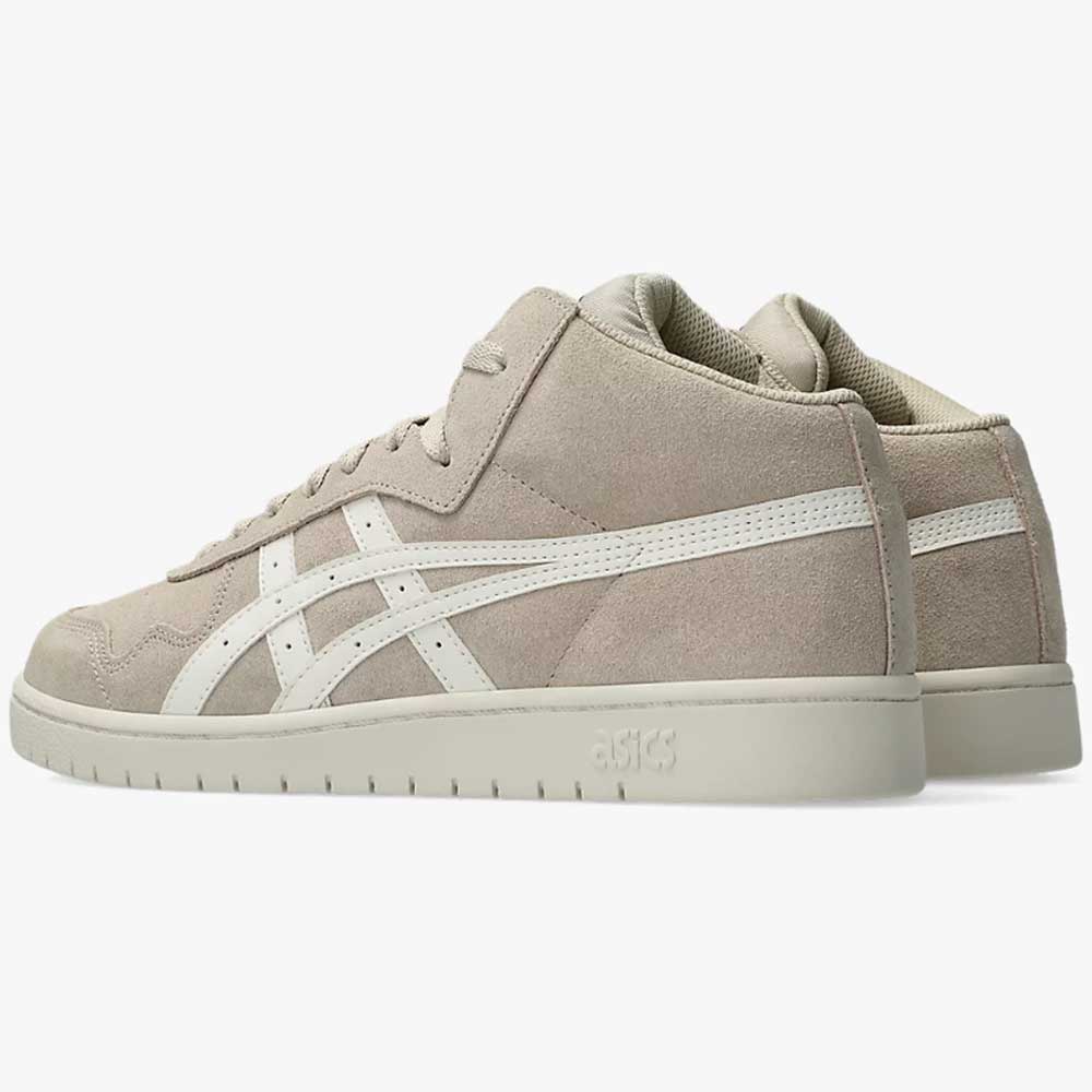 The Japan Pro MT Asics Feather Grey Cream 1201B033020 suede skateboarding shoes feature a mid-top design, white Asics stripes, matching beige soles, and GEL cushioning, shown against a plain white background.
