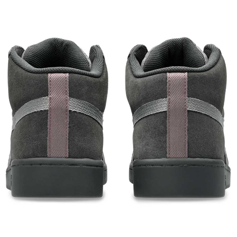 A rear view of the Japan Pro MT Asics Graphite Gray Cay Red 1203B088 021 suede skateboarding shoes featuring dark gray uppers, textured gray soles, gray side stripes, and mauve heel tabs, placed side by side on a white background.