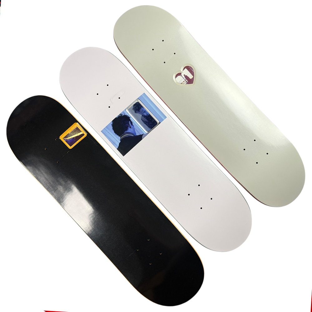 The Jim Greco Hammers 3 Board Deck Set Collectible displays three minimalist skateboard decks side by side on a white background, each featuring a small central graphic.