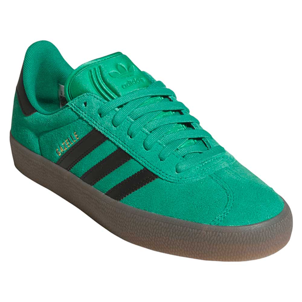 The KI3206 Green Black Gazelle ADV Adidas Skateboarding Suede Shoes feature black stripes, a gum sole, and gold GAZELLE text on the side—ideal for everyday wear, shown in a side-angle view highlighting the tongue.