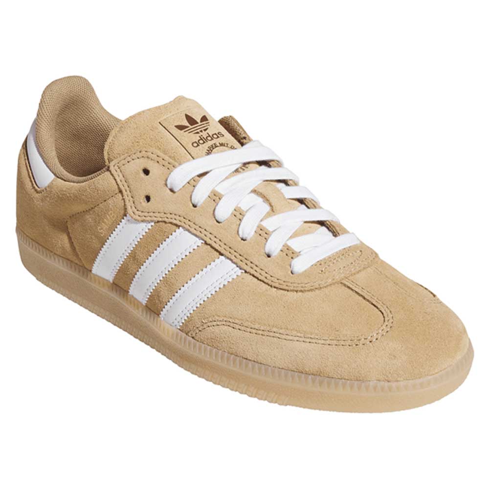 The KI5089 Tan White Samba ADV Adidas Skateboarding Suede Shoes feature white stripes, laces, the Adidas logo on the tongue, a beige rubber sole, and a classic retro design that’s both stylish and functional for skateboarding.