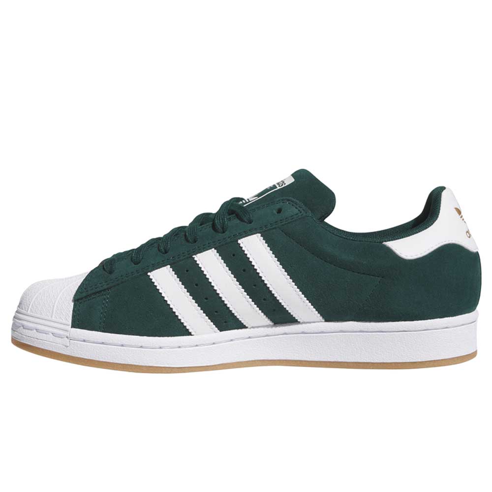 The KI5732 Green White Superstar ADV Adidas Skateboarding Suede Shoes feature signature white stripes, a white rubber toe cap, and a light brown gum sole—an ideal choice for skateboarding style and comfort.