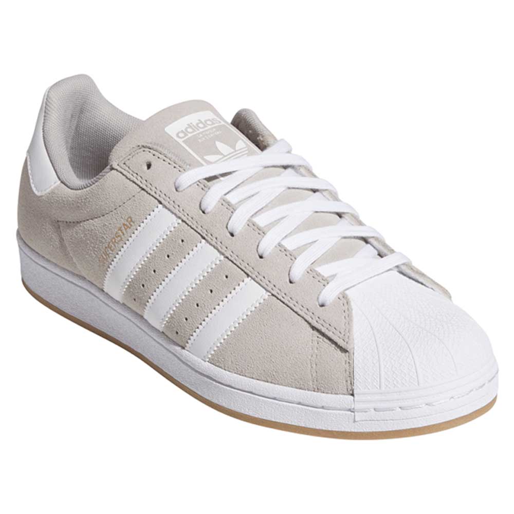The KI5733 Gray White Superstar ADV Adidas Skateboarding Suede Shoes feature signature three white stripes, a white toe cap, rubber sole, and the iconic Originals logo on the tongue and side.
