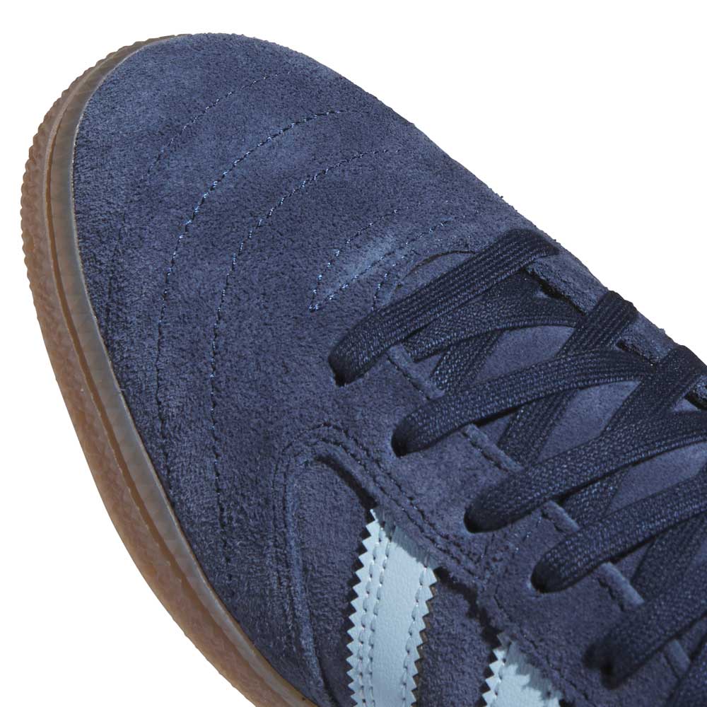 Close-up of the KJ5478 Blue Gum Busenitz Vintage Adidas Skateboarding Suede Shoes with dark blue laces, a gum rubber sole, and light blue stripes, perfect for the skate park.
