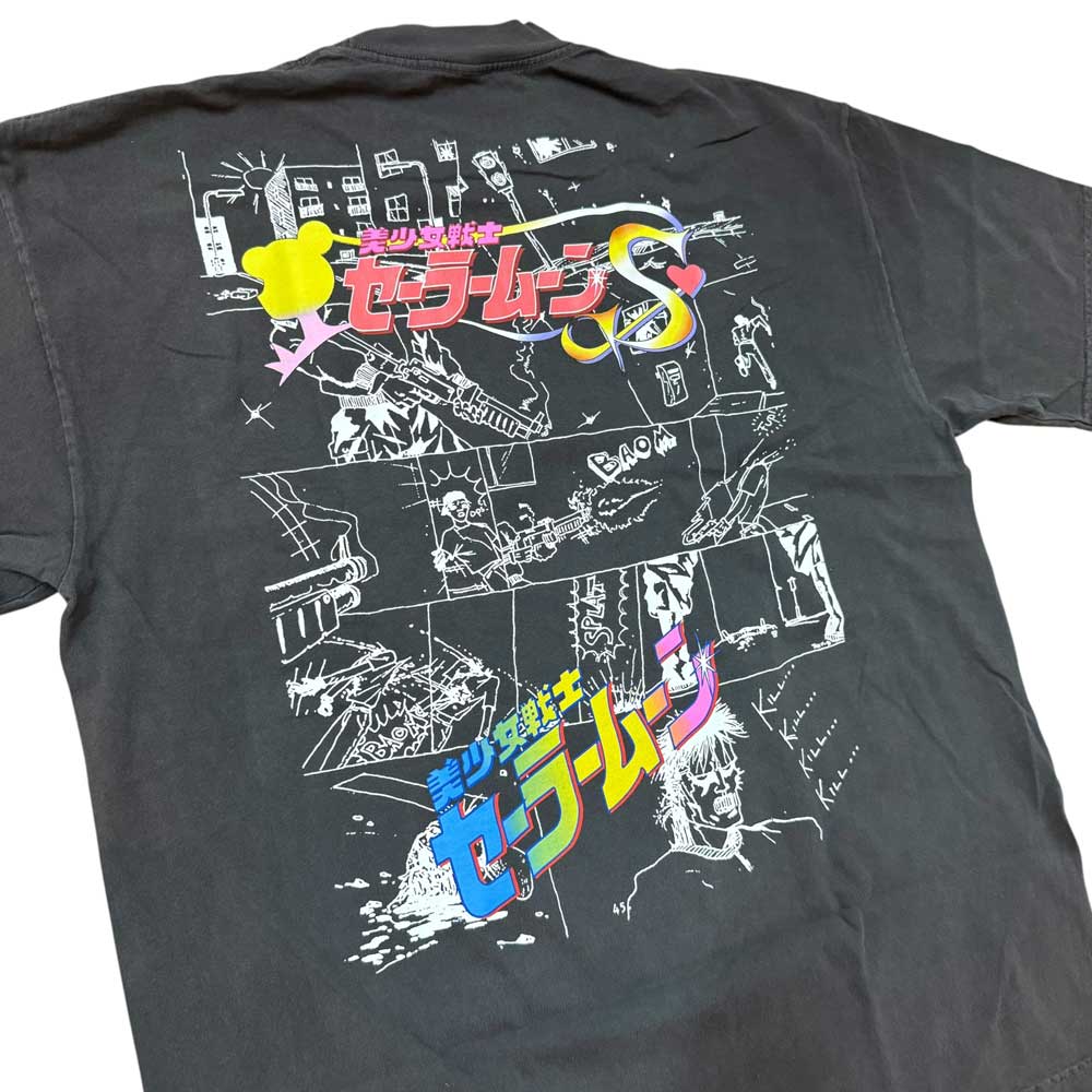 The Kill Kill Kill Vintage Black Tee Paradise is a black, pre-shrunk shirt with colorful Japanese text and stylized white comic-style action and cityscape sketches on the back.