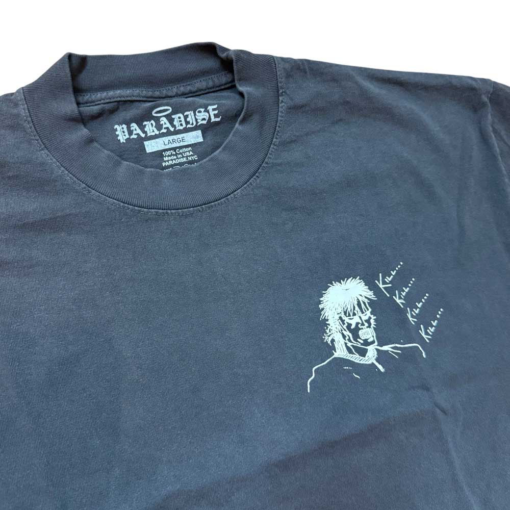 The Kill Kill Kill Vintage Black Tee Paradise is a black USA cotton t-shirt featuring a small white anime-style character and the repeated "Ken... Ken... Ken..." text on the chest, with a “PARADISE LARGE.” label.