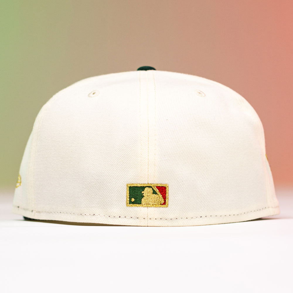 The La Cumbia WS05 Chrome Black Mexico Houston Astros New Era Hat 5950 Fitted is shown from the back, featuring the MLB logo in gold, green, and red embroidery above the adjustable area—a subtle yet stylish nod to Houston Astros fans.