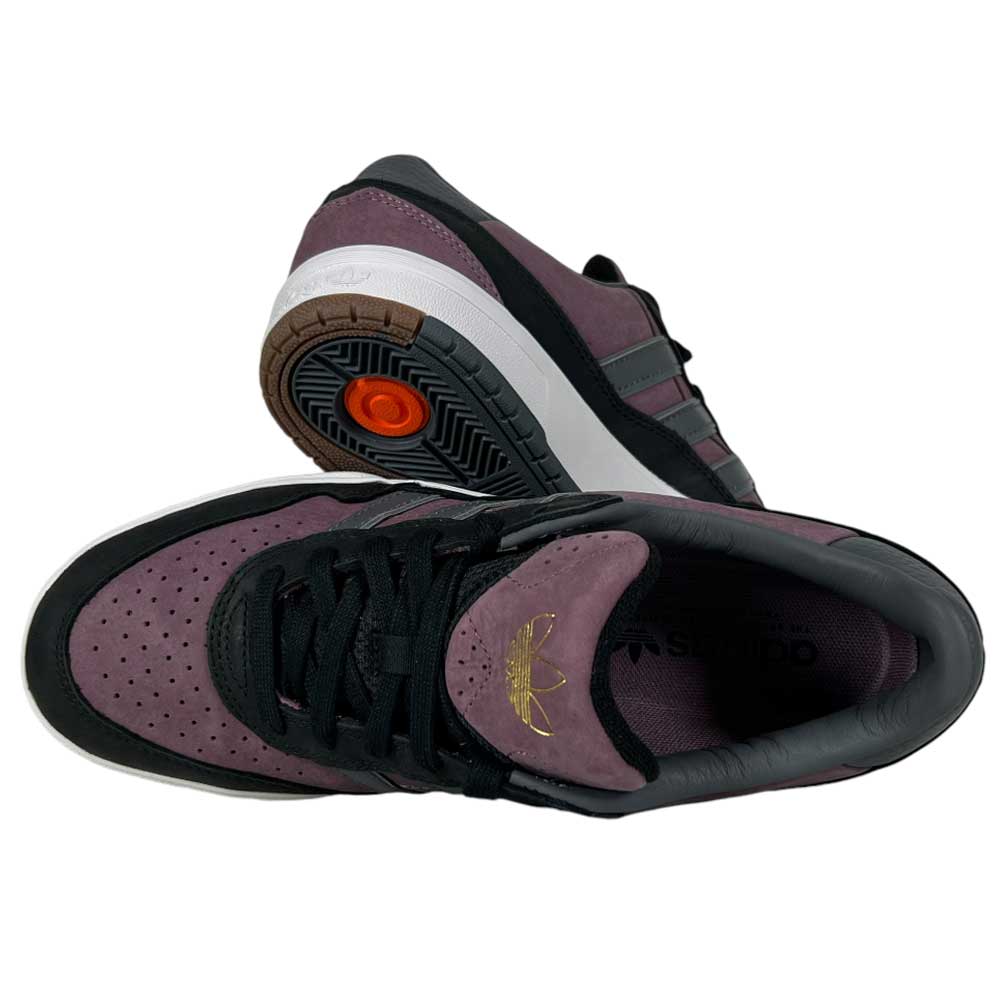 A pair of Lavandar Gray Black Tyshawn 2 II Adidas Skateboarding Leather Suede Shoes, featuring perforated toes and a gold Adidas logo on the tongue. One shoe stands to show side and sole; the other lies sideways for a top view.