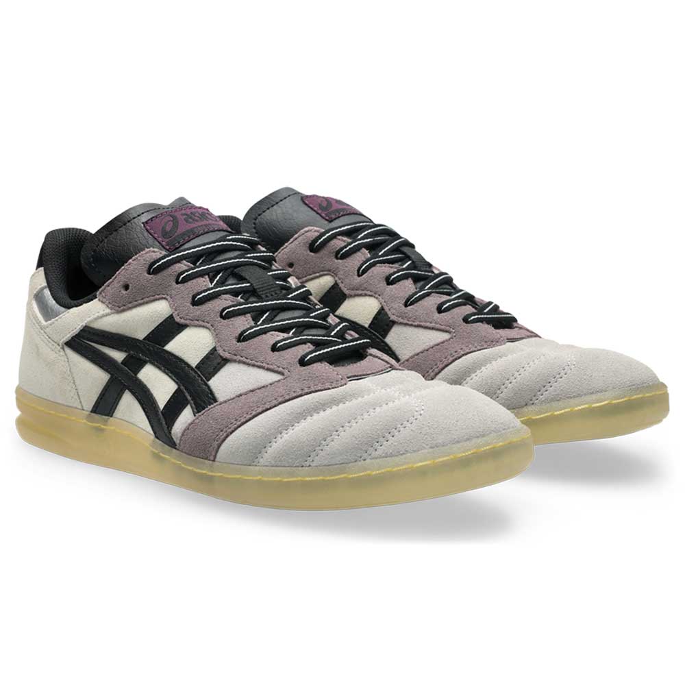A pair of Leggerezza Asics Oyster Grey Black 1203B087 020 suede skateboarding shoes with breathable mesh accents, black laces, and translucent yellow soles are displayed side by side on a white background.