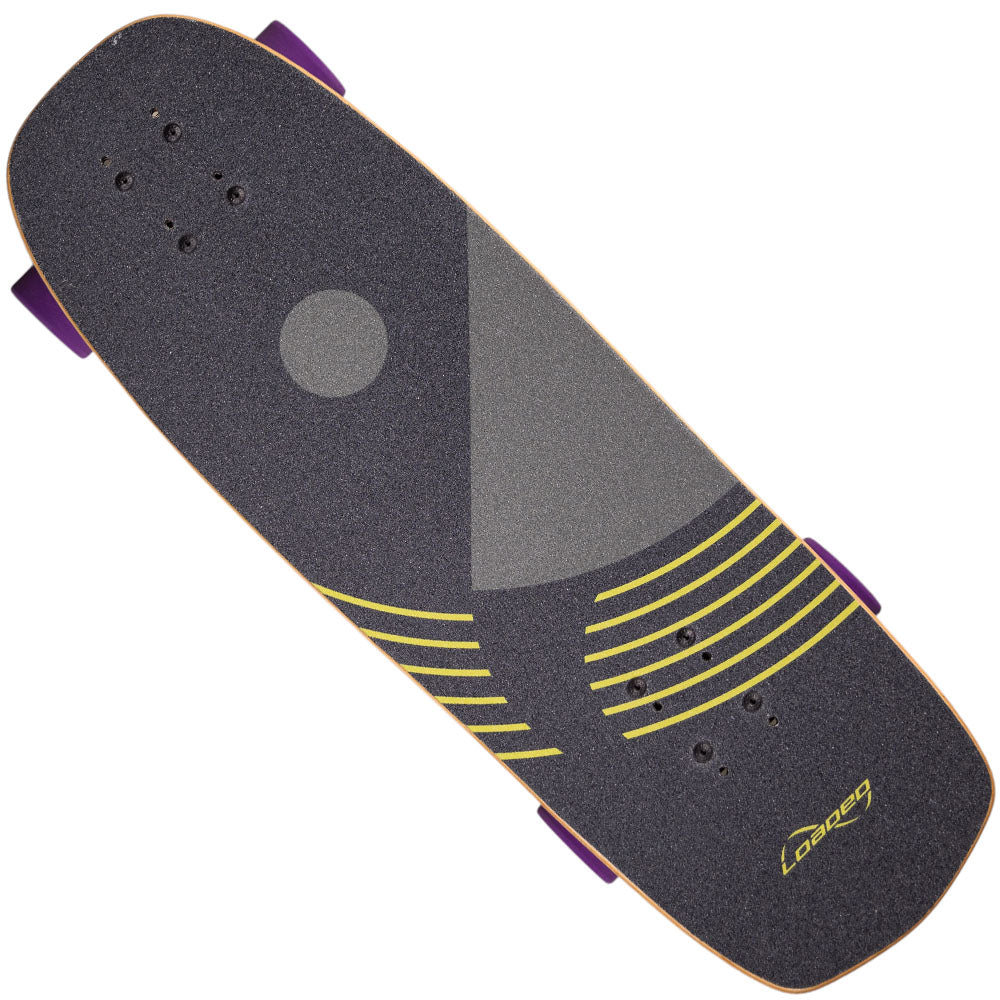 A top view of the Loaded Ballona 9x27.5 Complete Longboard, featuring black grip tape with a circular gray design, curved yellow lines, a yellow Loaded logo near the tail, and purple wheels visible under the deck.