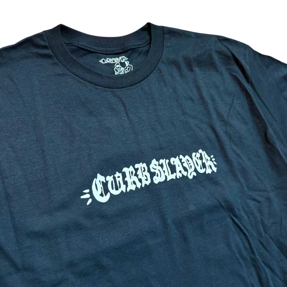 The Logo Black Tee Curbslayer features a bold, stylized CURB SLAYER logo across the chest on a black shirt, laid flat on a white background—an eye-catching statement piece for any fan.