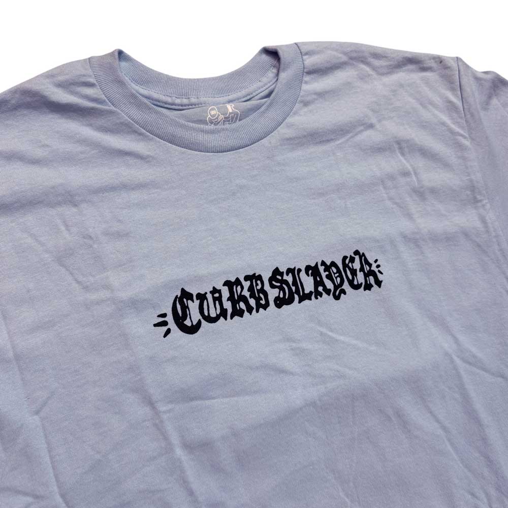 A light purple Curbslayer t-shirt featuring bold black Gothic-style lettering on the chest, inspired by the Logo Light Blue Tee Curbslayer.