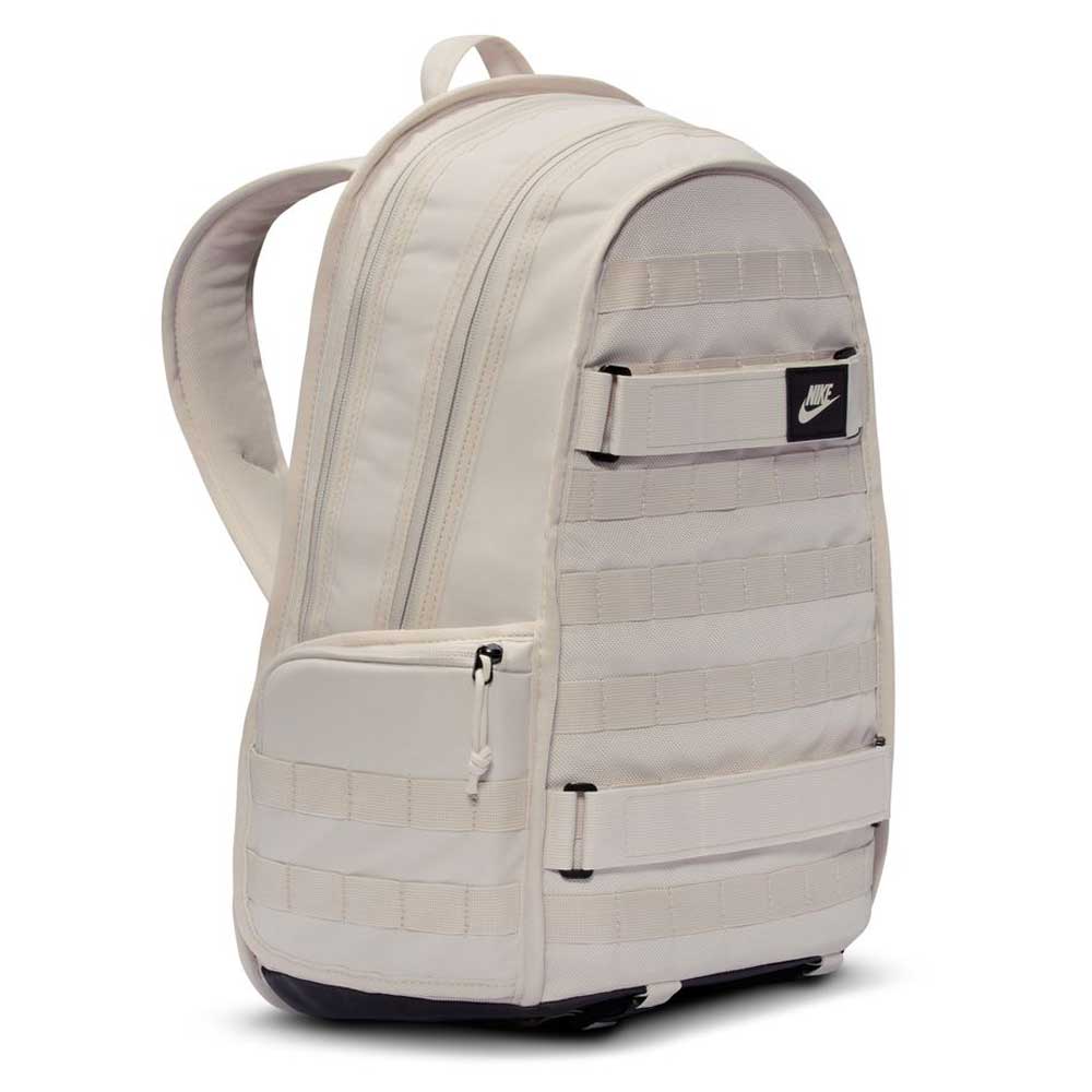 The Lt Orewood Brown Black FD7544104 Nike SB RPM Skate Backpack features a front zip pocket, skateboard-carry straps, small Nike patch, padded shoulder straps, and laptop compartment, shown angled against a white background.