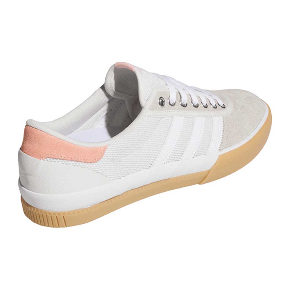 The Lucas Premiere White Coral HQ7524 Adidas Skateboarding Suede Shoes feature a white upper, beige suede toe, pale pink heel accent, gum rubber sole, white laces, and adidas’ signature white stripes on the side.