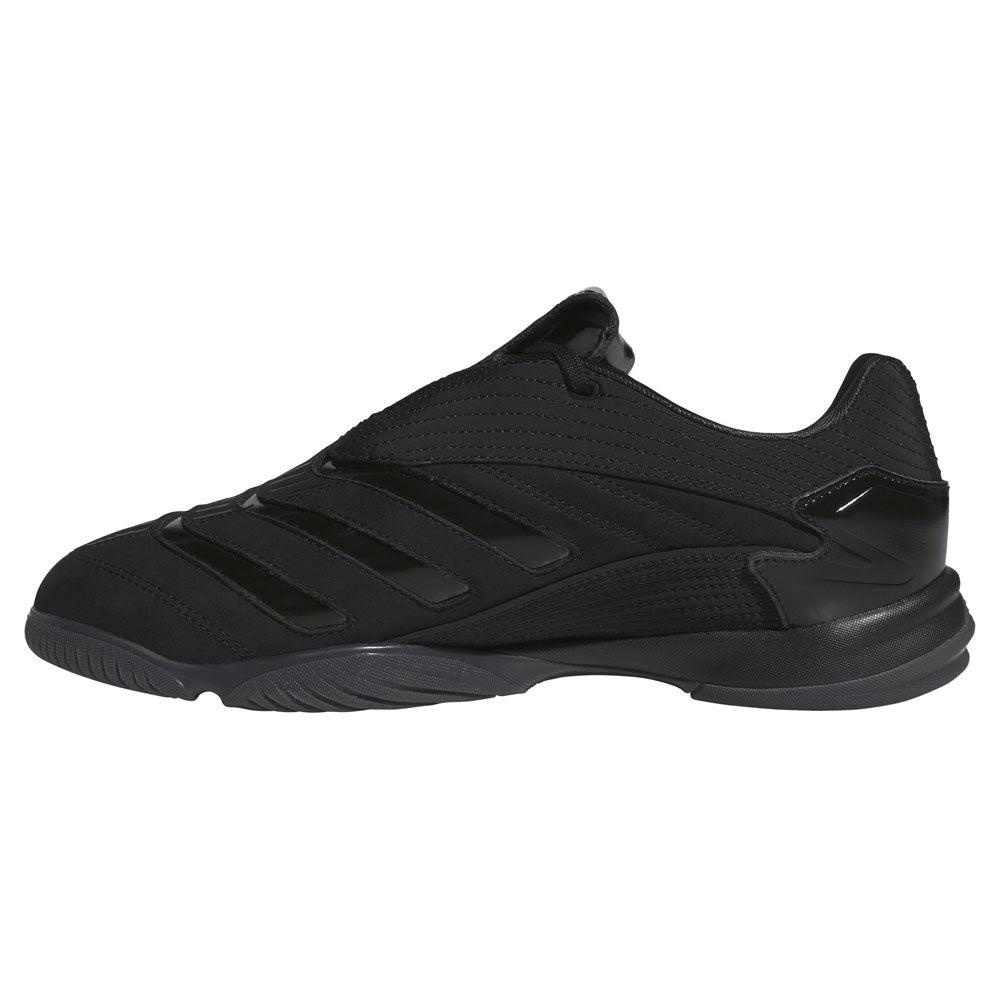 A black skateboarding shoe with textured accents, three understated stripes along the side, and a chunky rubber sole is displayed in a side profile on a white background—these Metalwood Predator Sala HP4953 Black Adidas Skateboarding Shoes embody the spirit of street culture footwear.