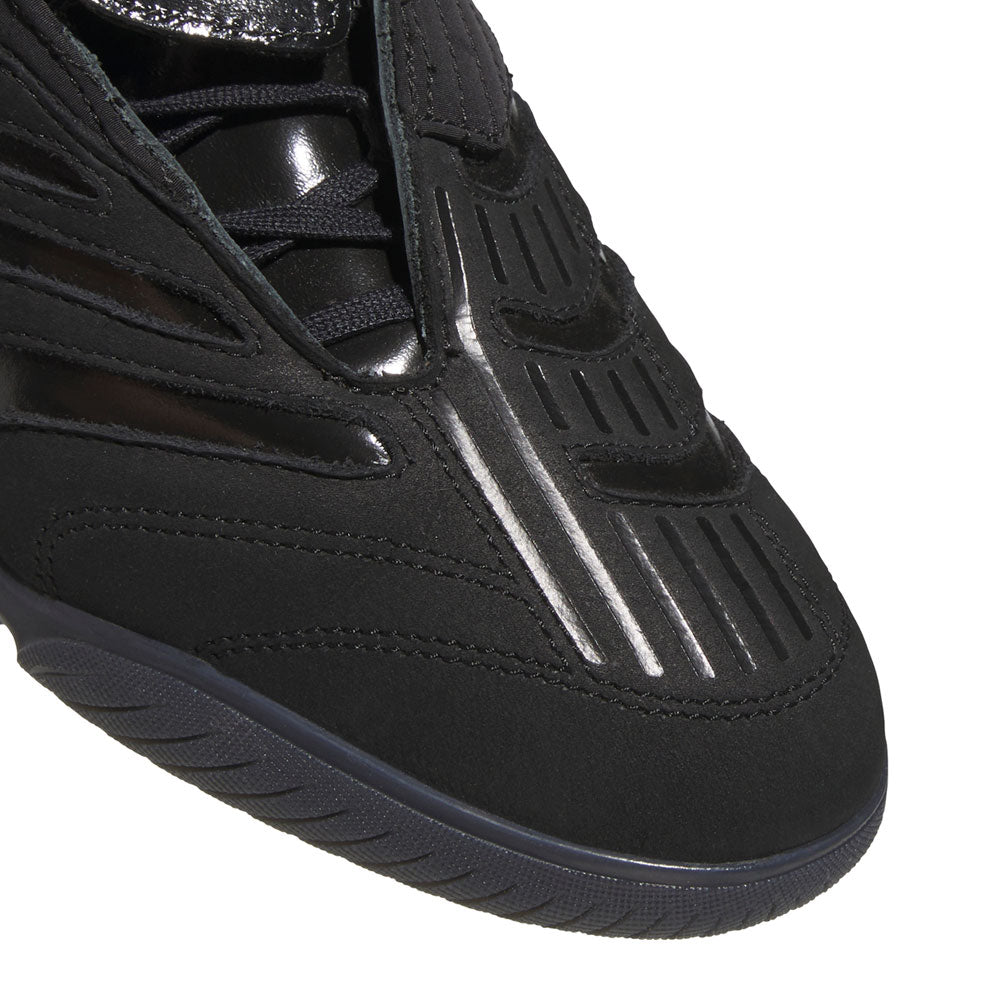 Close-up of the Metalwood Predator Sala HP4953 Black Adidas Skateboarding Shoe, showcasing textured and glossy details, black laces, and a dark rubber sole—capturing the signature street-inspired style of adidas Originals.