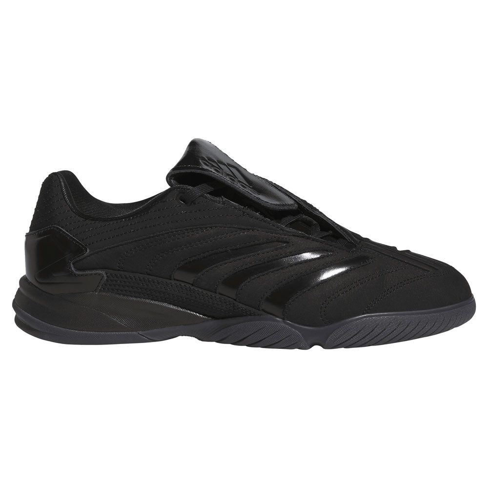 A black, low-profile sneaker with a textured sole and subtle glossy accents on the side, the Metalwood Predator Sala HP4953 Black Adidas Skateboarding Shoes capture street culture style. The partly raised tongue reveals intricate stitching details on the upper—an unmistakable nod to iconic designs like the Predator Sala x Metalwood Shoes.