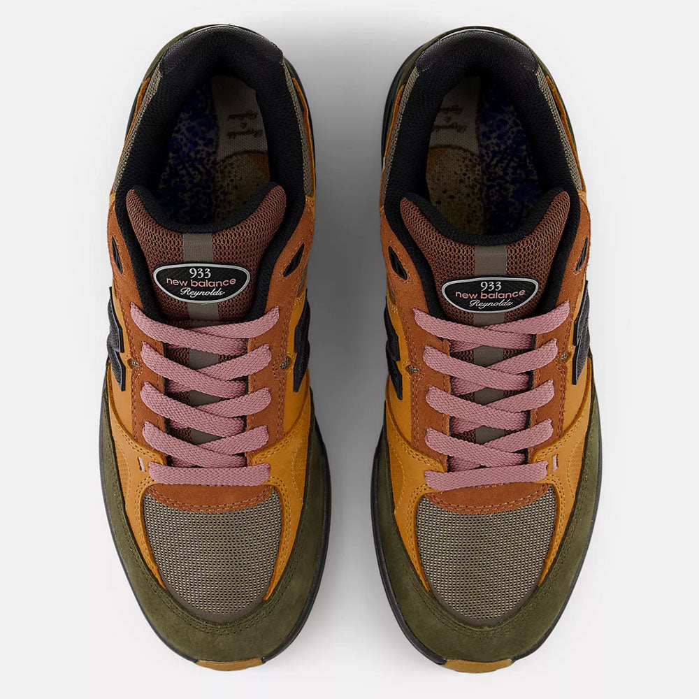 Top view of Mike Gigliotti True Brown Candy Pink 933 LOT New Balance Numeric suede skateboarding shoes with brown, olive green, mustard yellow, orange panels, black accents, and pink laces on a white background.