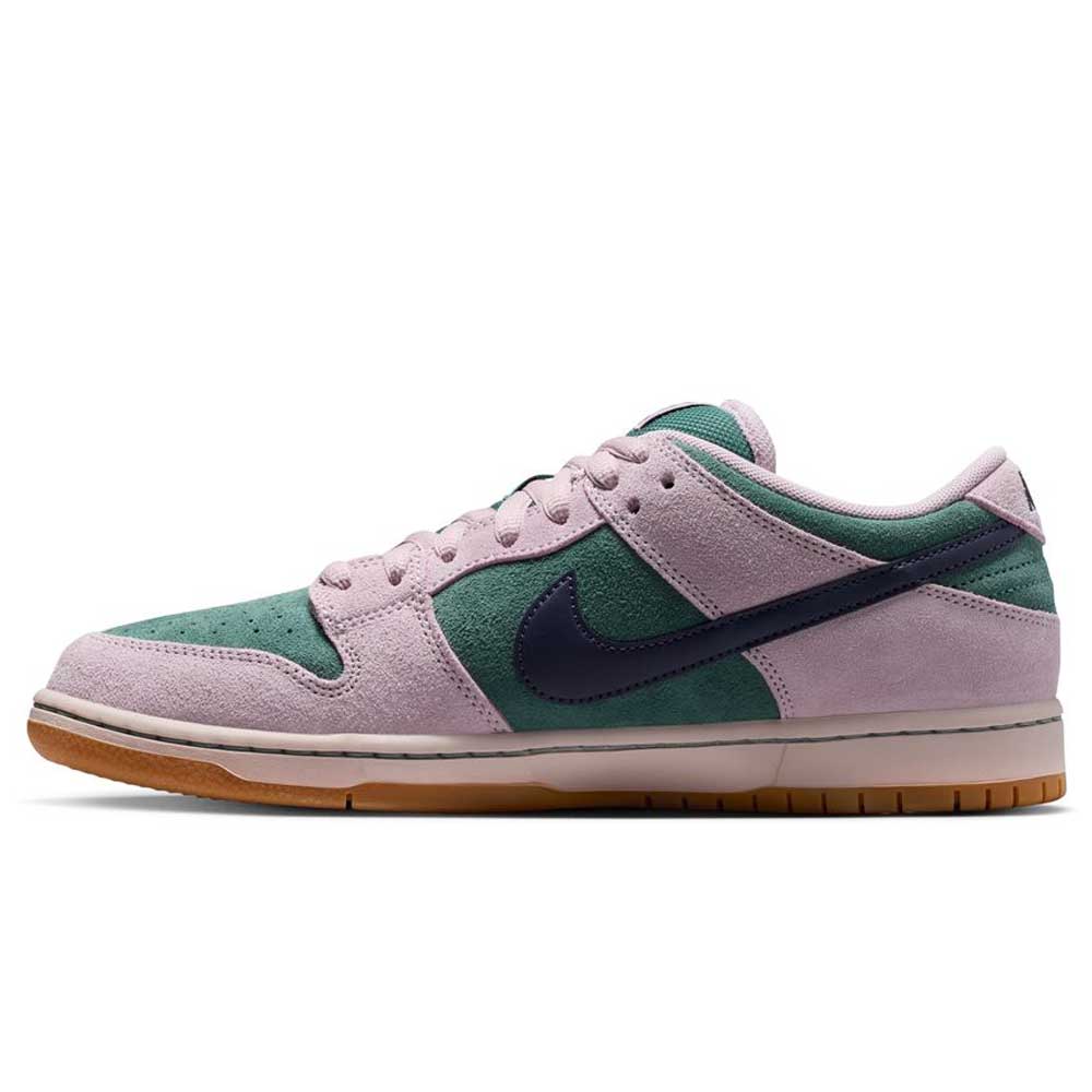 The Minereal Slate Dark Raisin Dunk Low Pro HQ1625300 Suede Skateboarding shoe features a green suede upper, light pink suede overlays, a dark navy Swoosh, and gum sole, shown in side profile against a white background.