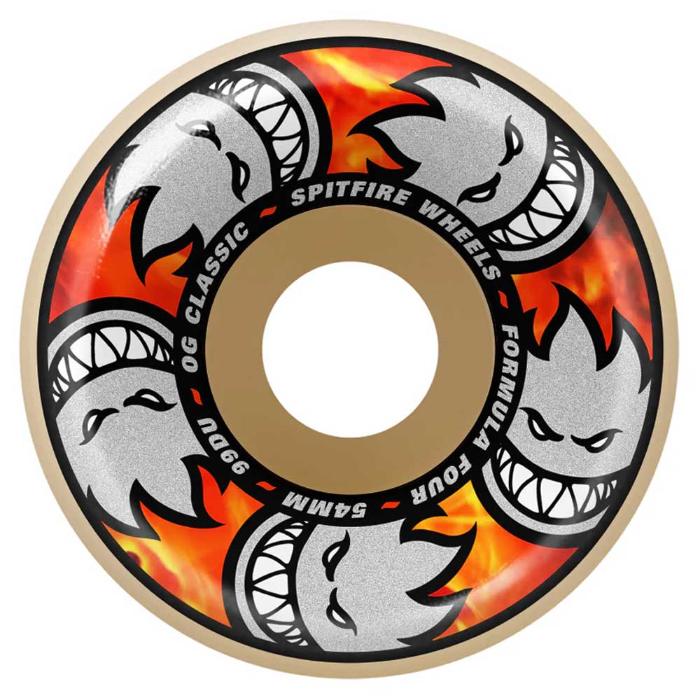 A skateboard wheel with a beige outer edge, fiery orange and red flames, and white cartoon faces with sharp grins. Text: Multiball 54mm99A Formula Four Spitfire Wheels OG Classic.
