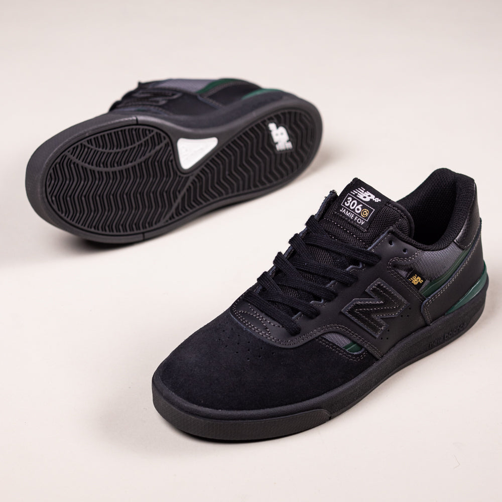 A pair of Black Nightwatch Green Jamie Foy Cup 306 CSP New Balance Numeric suede skateboarding shoes are displayed on a light surface—one shows the top and side, the other reveals the sole.
