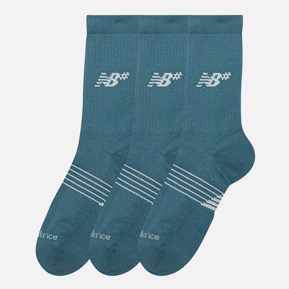 Three pairs of New Balance Numeric 3 Pack Socks in Salt Water Green (AC0048UAAU) feature teal crew skater style with white logos on the ankle, white toe stripes, and a cushioned foot bed, displayed on a plain white background.