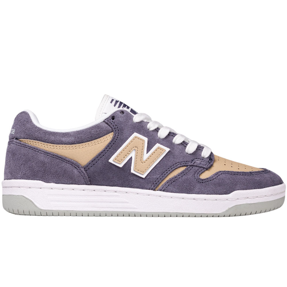 The 480 NAD New Balance Numeric Suede Skateboarding Shoe is displayed from a side view against a white background, featuring purple suede and beige leather panels, white laces, a white and gray sole with responsive FuelCell foam, and a white “N” logo on the side.