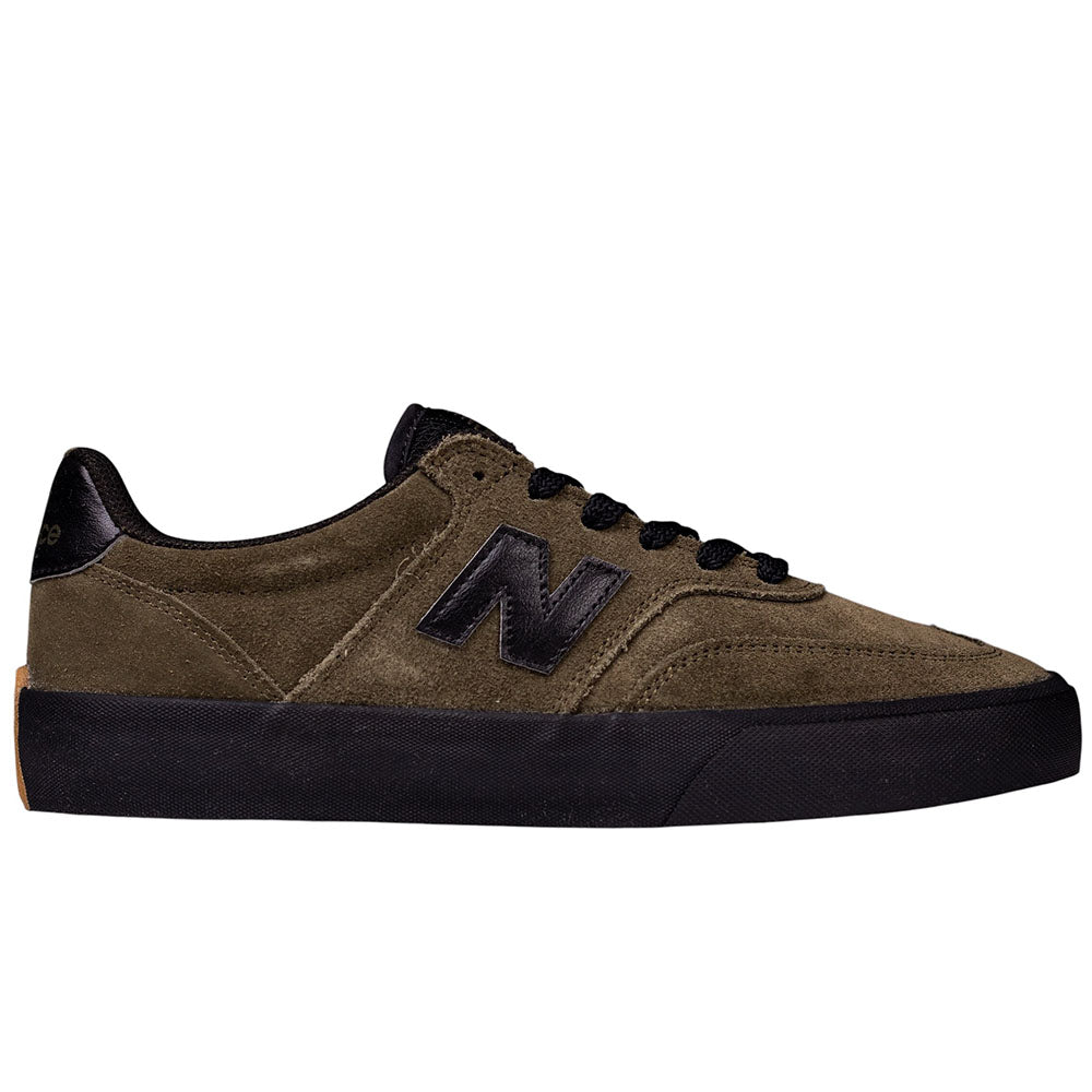 The 340 IWT New Balance Numeric Suede Skateboarding Shoes feature an olive green suede upper with a black sole, black laces, and a black “N” logo on the side. This low-top, casual skate shoe includes a reinforced toe cap for enhanced durability and is photographed against a white background.