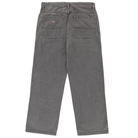 The P415259 Loose Double Knee Woven Denim Jean in Grey Wash Tinted by Dickies Skateboarding is shown from the back, with two large back pockets, a red and white logo on the right pocket, and a straight-leg cut for style and durability.