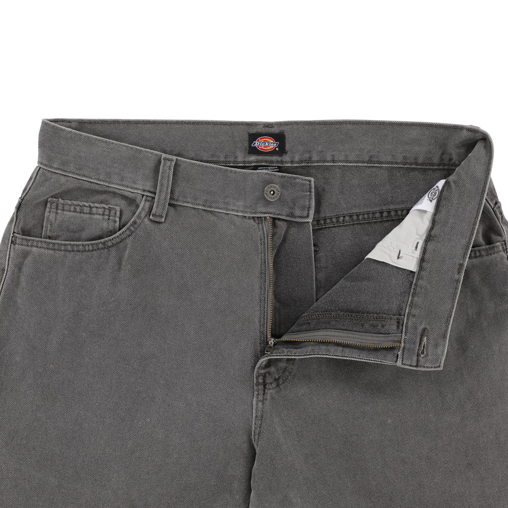 A pair of P415259 Loose Double Knee Woven Denim Jeans in Grey Wash Tinted from Dickies Skateboarding, with the top button fastened and zipper partially open to show the inner waistband and pocket lining.