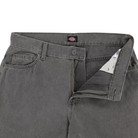 A pair of P415259 Loose Double Knee Woven Denim Jeans in Grey Wash Tinted from Dickies Skateboarding, with the top button fastened and zipper partially open to show the inner waistband and pocket lining.