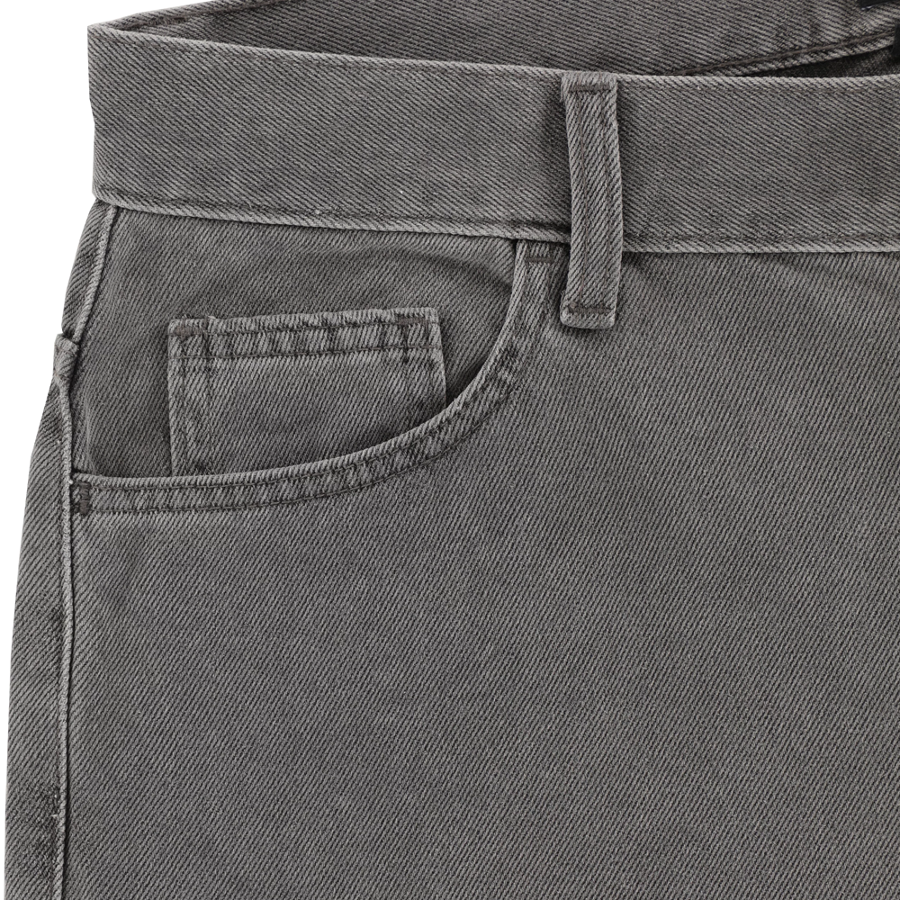 Close-up of the P415259 Loose Double Knee Woven Denim Jean in Grey Wash Tinted by Dickies Skateboarding, showing the upper front section with waistband, belt loop, front pocket, and visible stitching details.