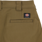 Close-up of the back of the Dickies Skateboarding P415315 Mike Anderson Dark Olive Twill Pant, showing a single welt pocket and black Dickies label—an ideal, durable work pant choice.
