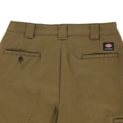 Close-up of the back of the P415315 Mike Anderson Dark Olive Twill Pant by Dickies Skateboarding, featuring two welt pockets (one with a button), belt loops, and a small Dickies logo patch on the waistband.