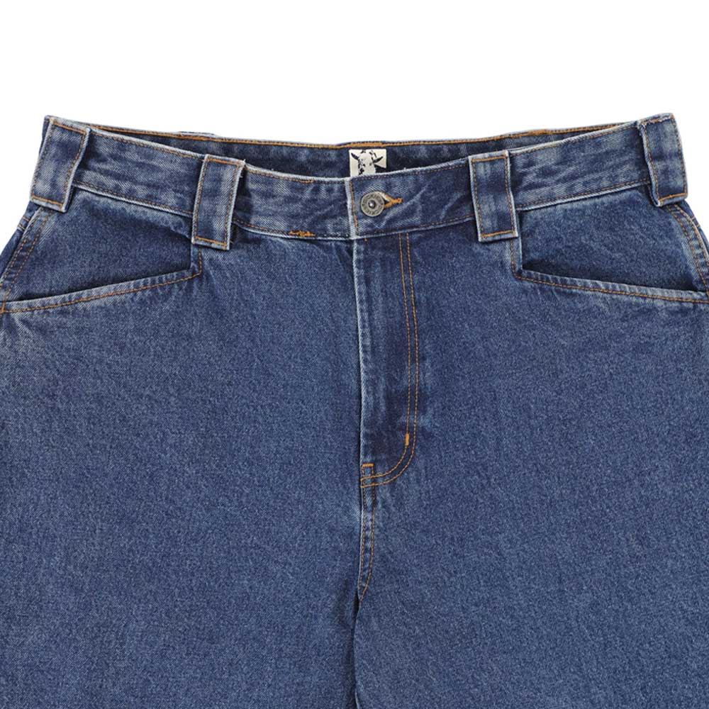 A close-up of the upper section of the P415316 Mike Anderson Stonewashed Denim Jean Dickies Skateboarding, highlighting the waistband, belt loops, front pockets, button closure, and visible orange stitching.