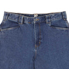 A close-up of the upper section of the P415316 Mike Anderson Stonewashed Denim Jean Dickies Skateboarding, highlighting the waistband, belt loops, front pockets, button closure, and visible orange stitching.