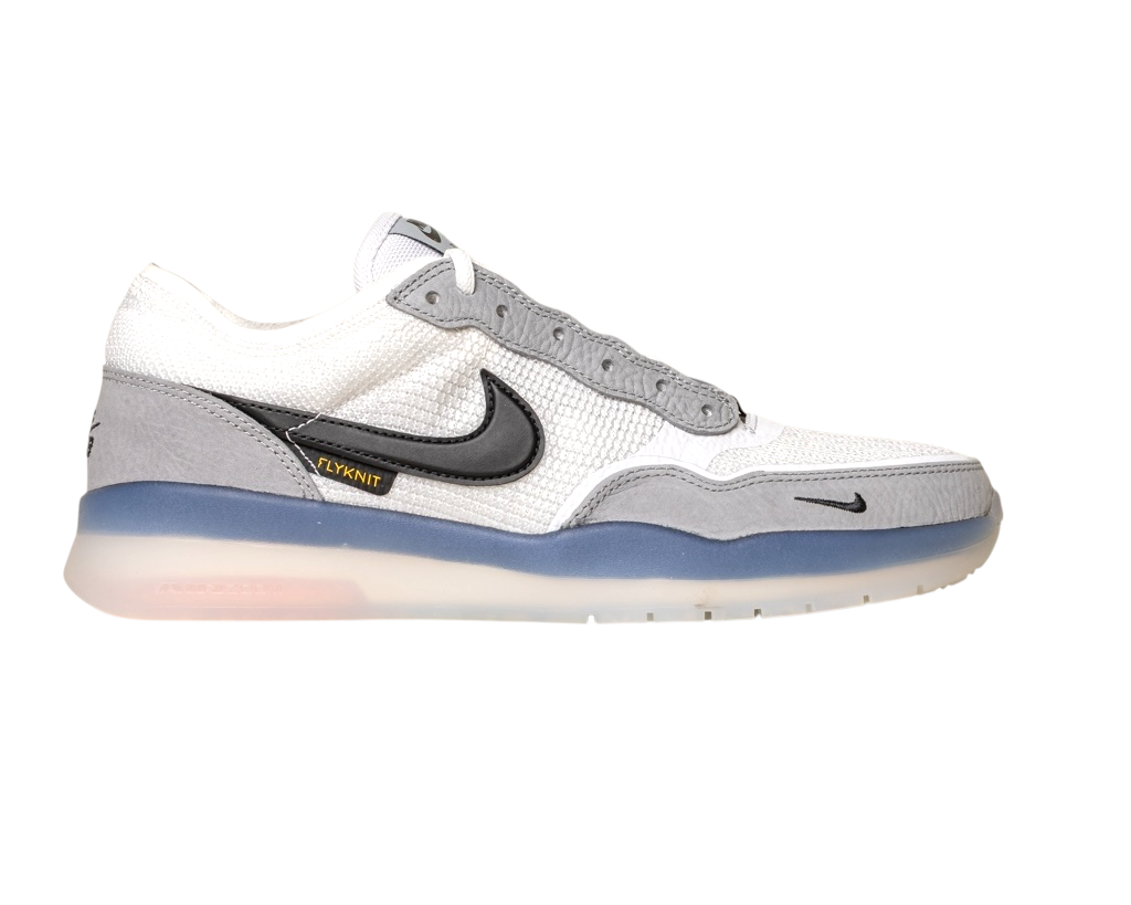 The FV8493004 Grey White PS8 Nike SB Leather Knit Shoes feature a white and gray design, black swoosh, gray suede details, mesh upper, translucent blue and white sole, and a small yellow "Flyknit" tag near the swoosh.