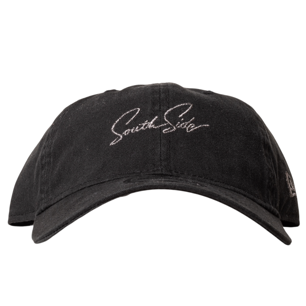 The Southside Pewter Script Strapback 920 Hat by New Era features cursive white South Side embroidery on the front, a curved brim, visible stitching, and an adjustable strapback for classic style and comfort.