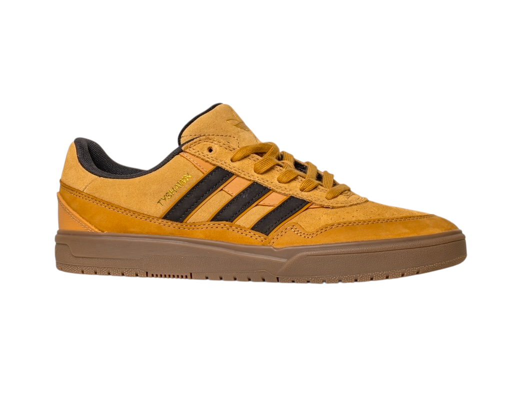 The JI0851 Mesa Black Gum Tyshawn 2 Adidas skateboarding shoes feature mustard yellow suede, black stripes, a gum sole, gold TONAL text on the side, and cupsole construction inspired by the Tyshawn II. Side view shown on white background.